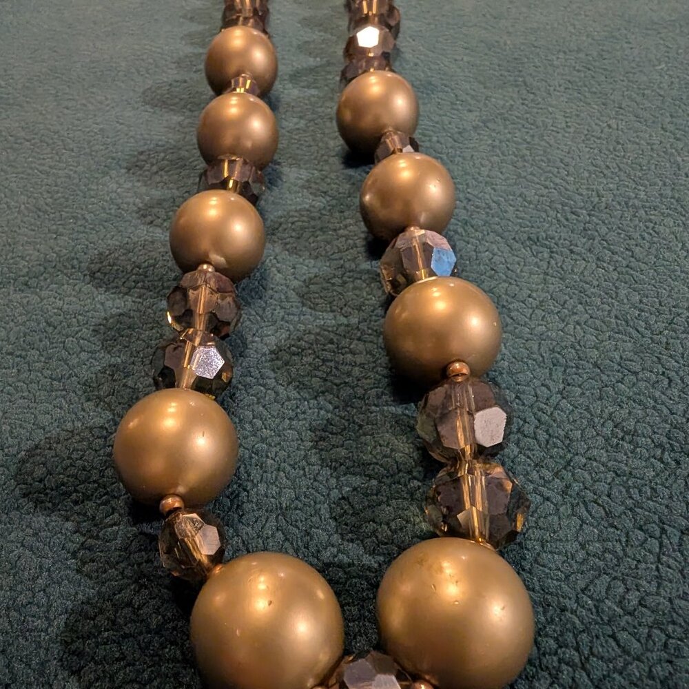 Rich deep interest, is a description of this vintage 32" Carolee necklace,